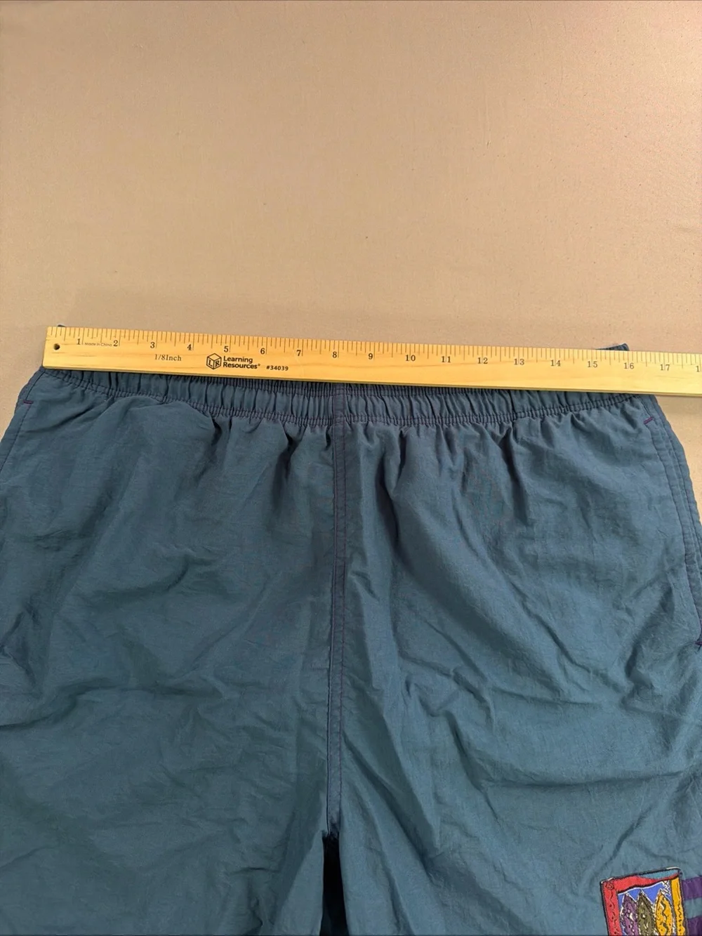Vintage Men's Teal Elastic-Waist Swim Trunks with Embroidered Logo Patch